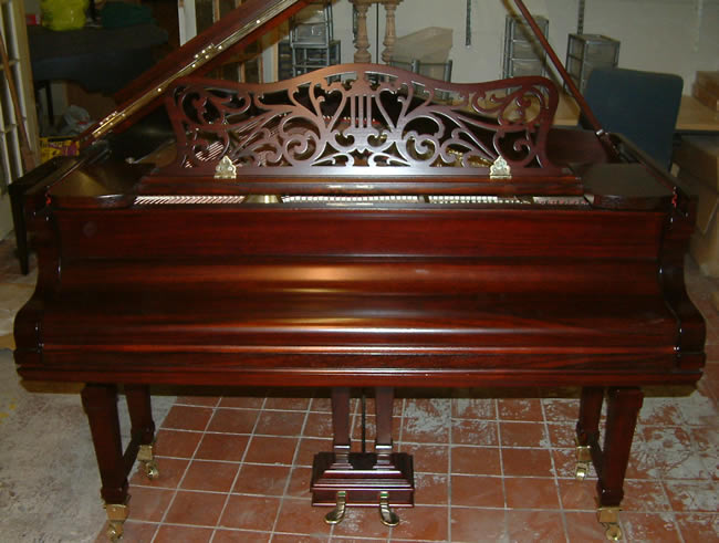 Chappell baby grand repolished in a rosewood satin cabinet.
